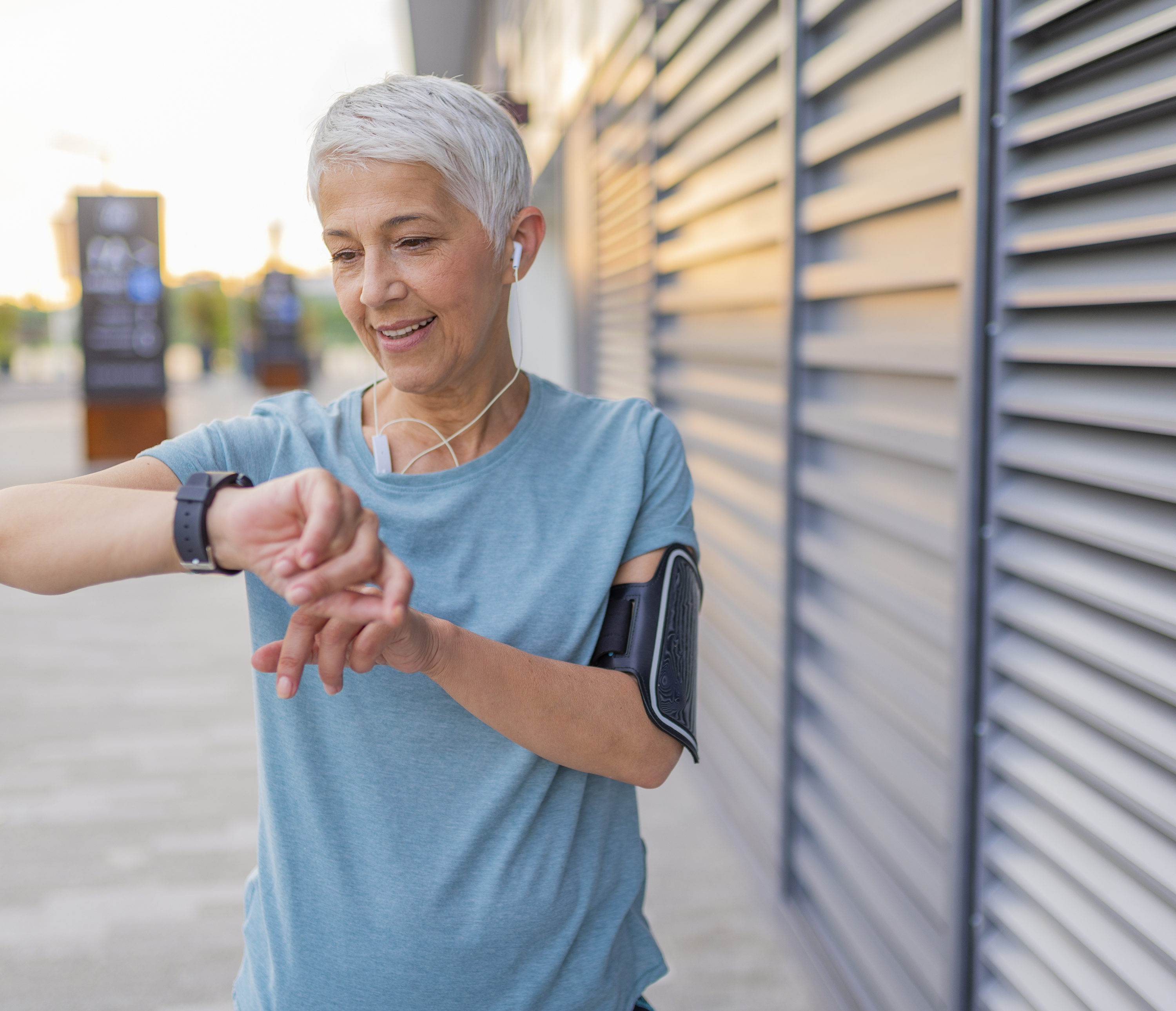 Woman exercising with smartwatch